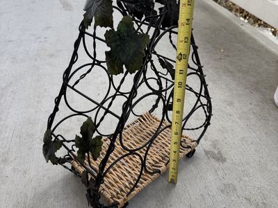 Wrought Iron and Wicker Wine Rack with Grapevine Accent