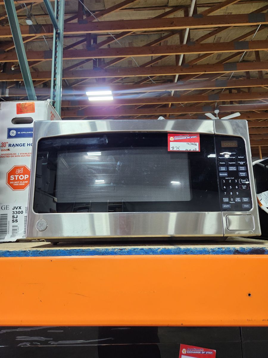 Nice GE Stainless Steel Counter Top Microwave! Low Price Guaranteed