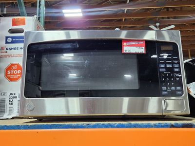 Nice GE Stainless Steel Counter Top Microwave! Low Price Guaranteed