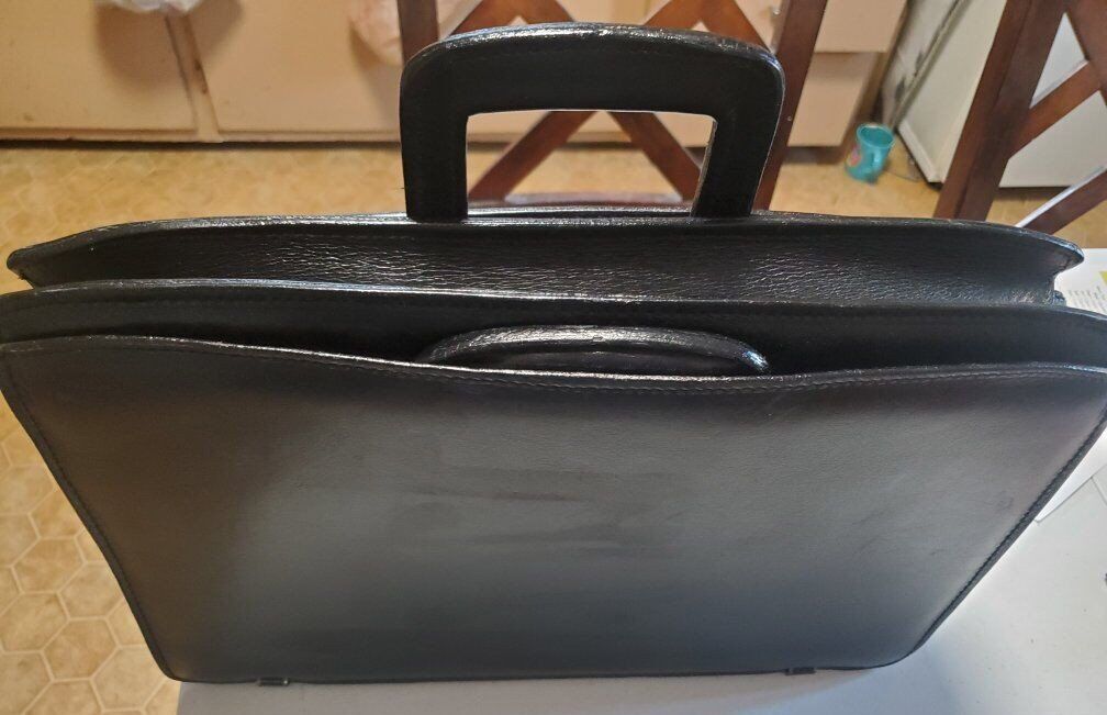 LEATHER  CASE LAP TOPS ETC.