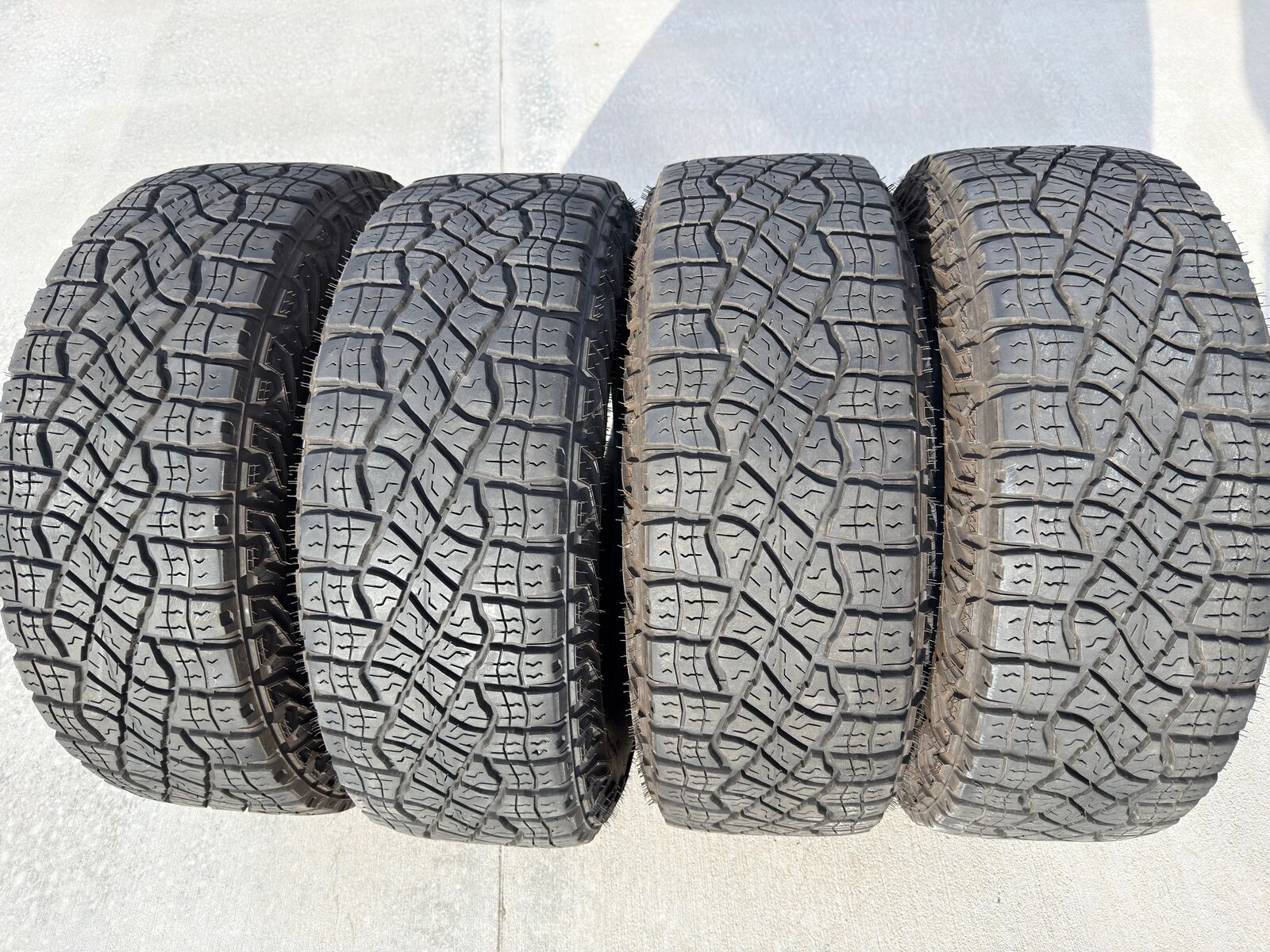 Four Used LT275/65R18 Goodyear Wrangler Tires