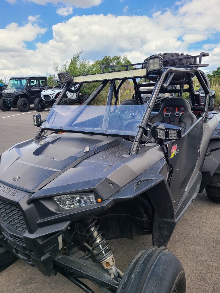 Polaris RZR Side-by-Side UTV - Paddle Tires, Light Bar, Roof Rack & Racing Seats