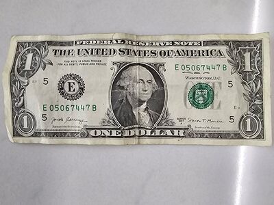 One dollar bill with 05/06/74