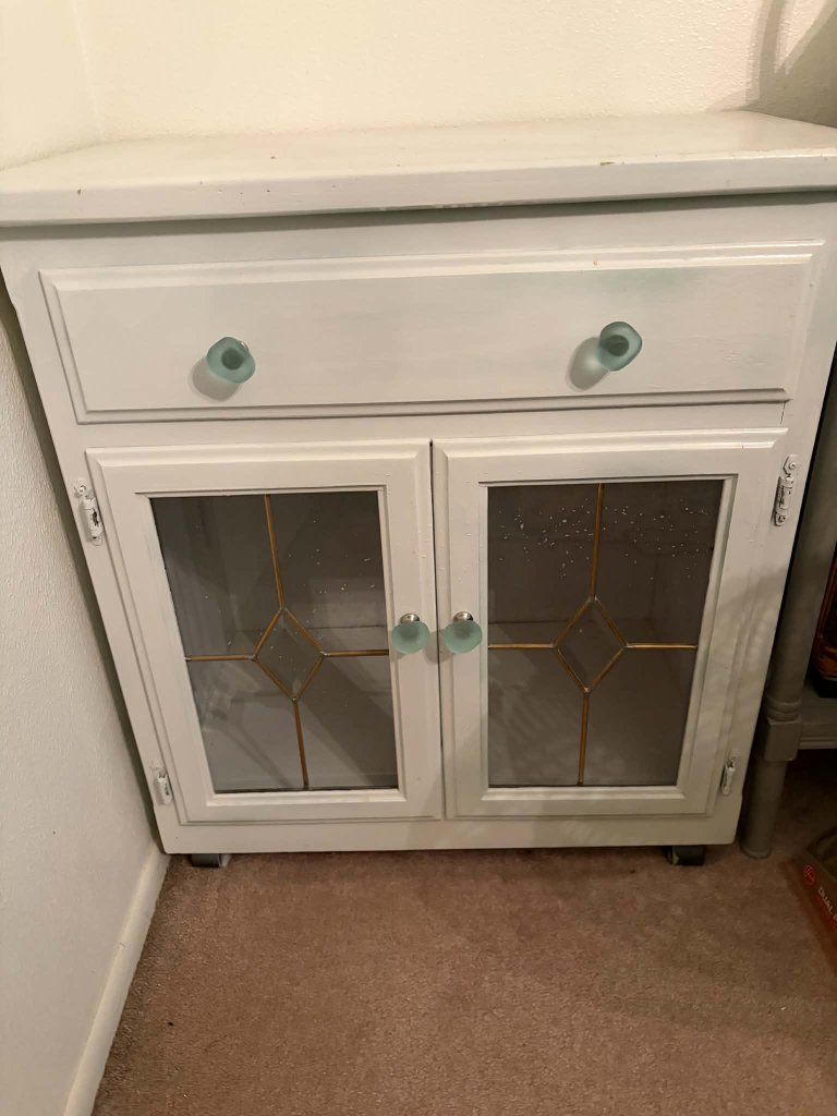 White Wooden Cabinet with Vintage Glass Doors