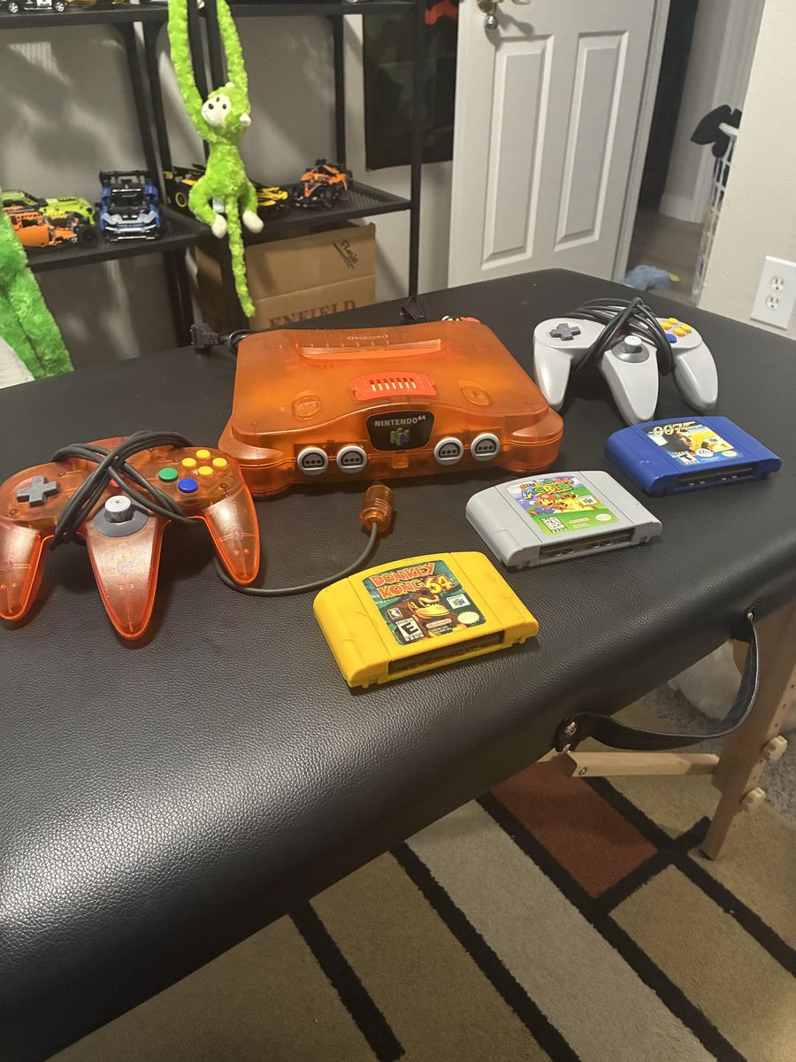 Nintendo 64 N64 Fire Orange Console Bundle w/ 2 Controllers, RAM Expander & 3 Games