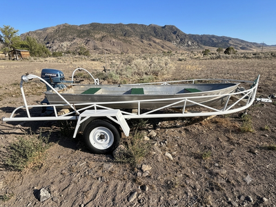 14’ aluminum boat with trailer
