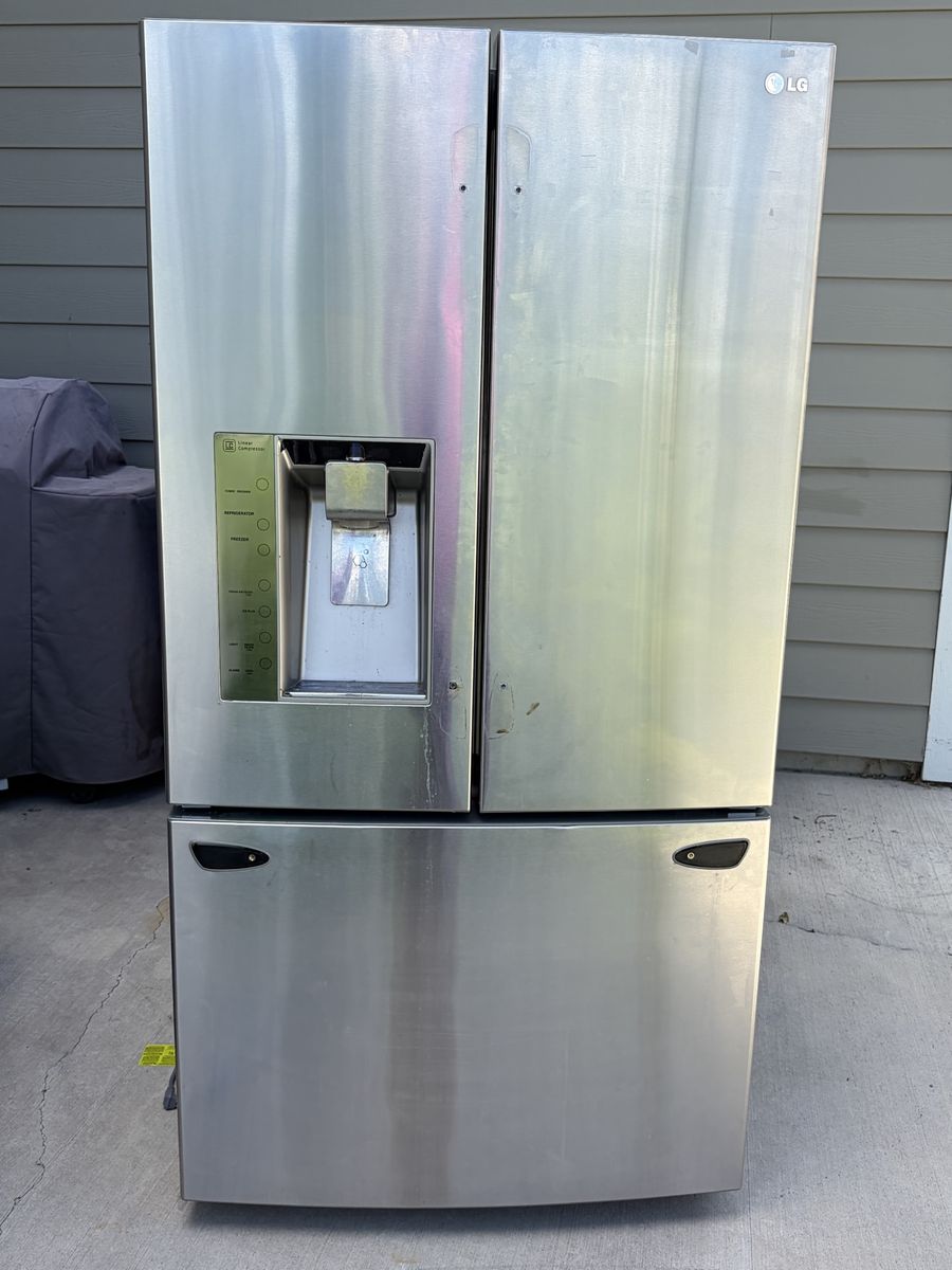 LG French Door Refrigerator Stainless Steel with Water Dispenser.  The Ice machine is not working but can be replaced.  
