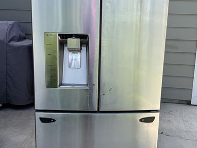 LG French Door Refrigerator Stainless Steel with Water Dispenser. The Ice machine is not working but can be replaced.