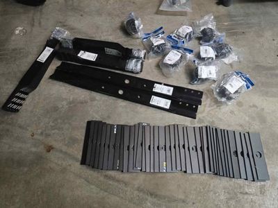 Lawn mower blades and weed wacker heads