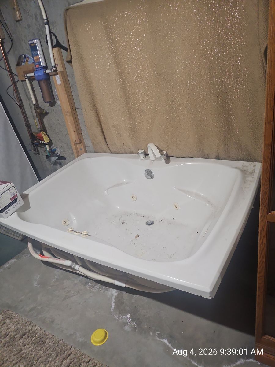 Jetted Bathtub with Pump and Faucet Fixtures