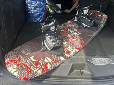 144 CM Hyperlite Wake board with four fins, XL Bindings great shape not a lot of use. Check pictures for Details.
