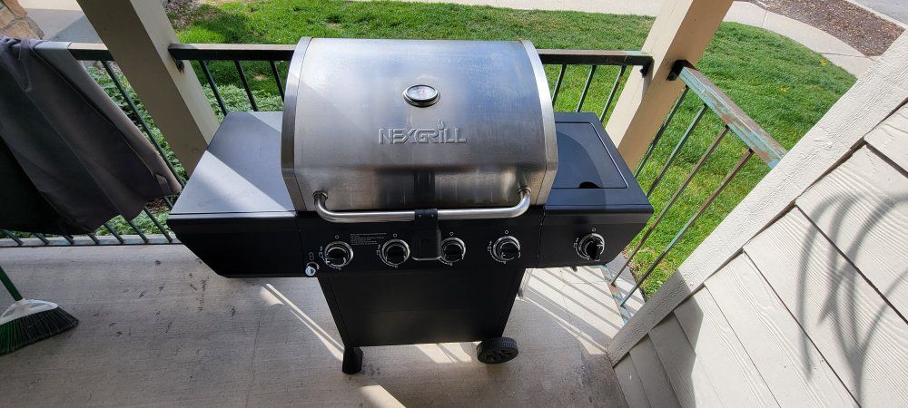 Nexgrill 4-Burner Propane Gas Grill with Stainless Steel Lid & Side Burner