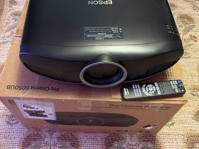 Epson Pro Cinema 6050UB 4K PRO-UHD 3-Chip Home Theater Projector with Remote Extra Bulbs and screen.