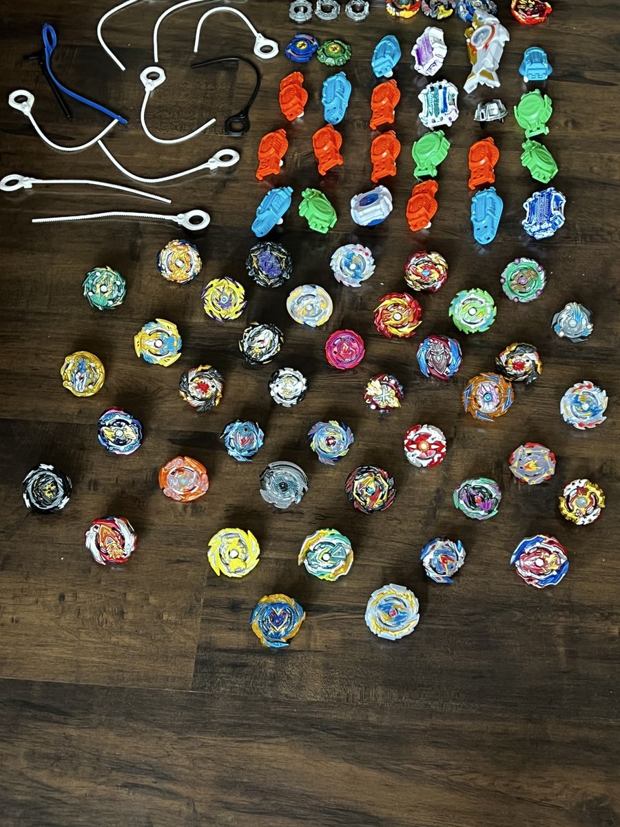 Large Beyblade Burst Lot - Spin Tops, Launchers, & Accessories