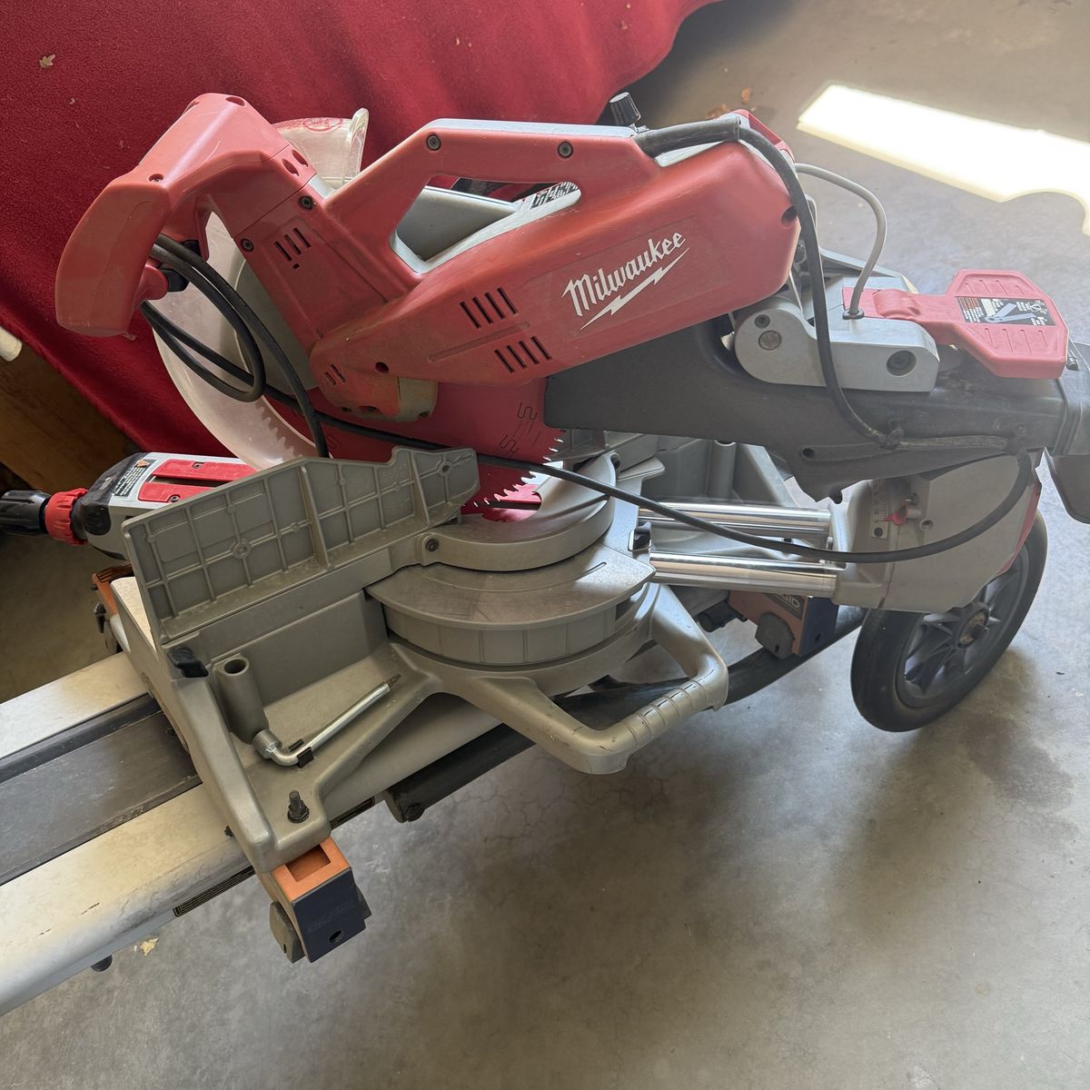 Milwaukee 12-Inch Sliding Compound Miter Saw (Model 6955-20) with Ridgid Stand