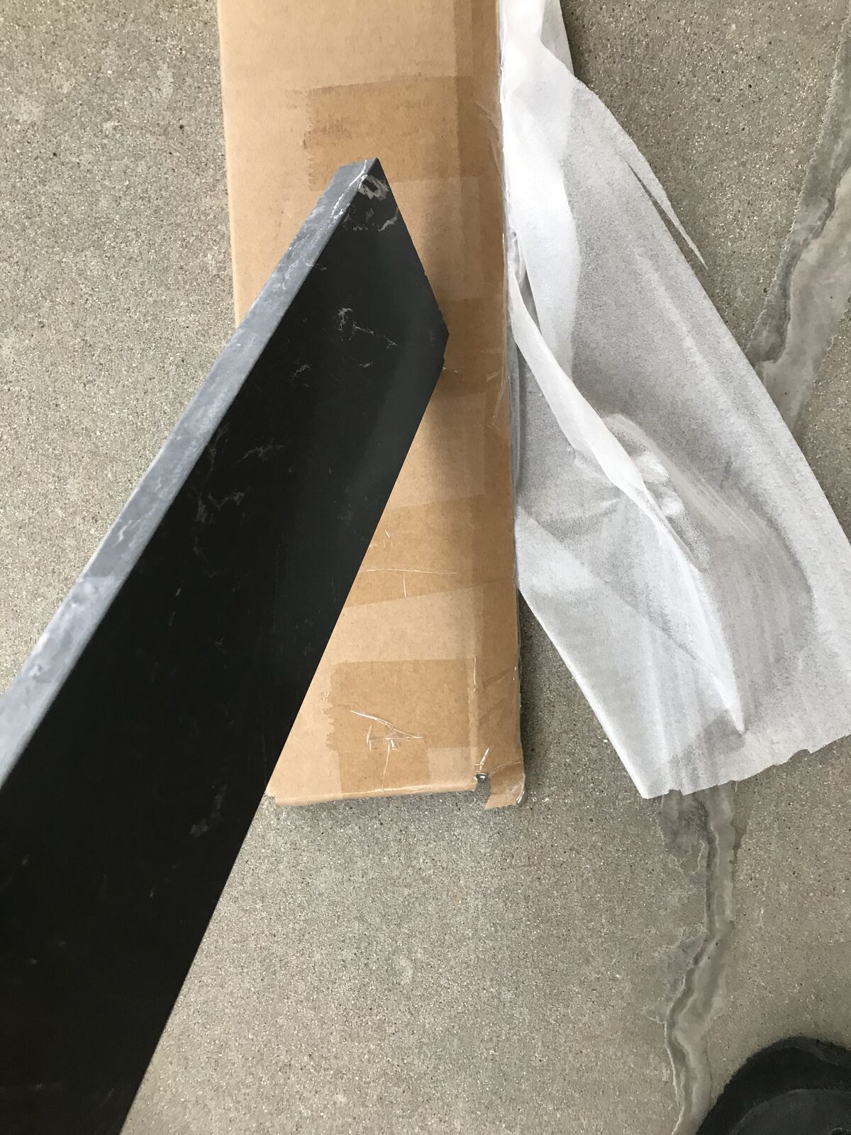 5 foot long Black marble splash back thats broken into three pieces 14,20 and 25 inches long