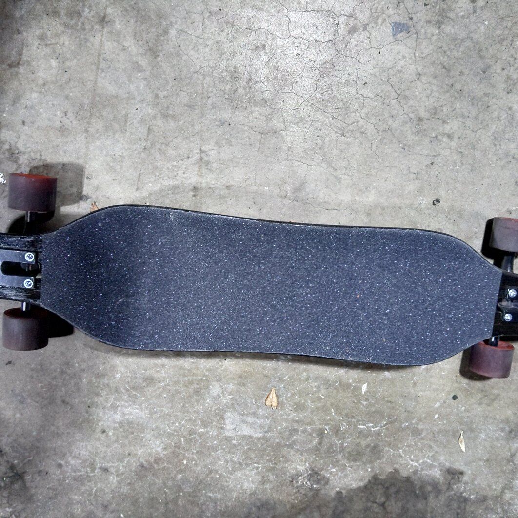 Longboard 28 x 9 deck with new grip top tape