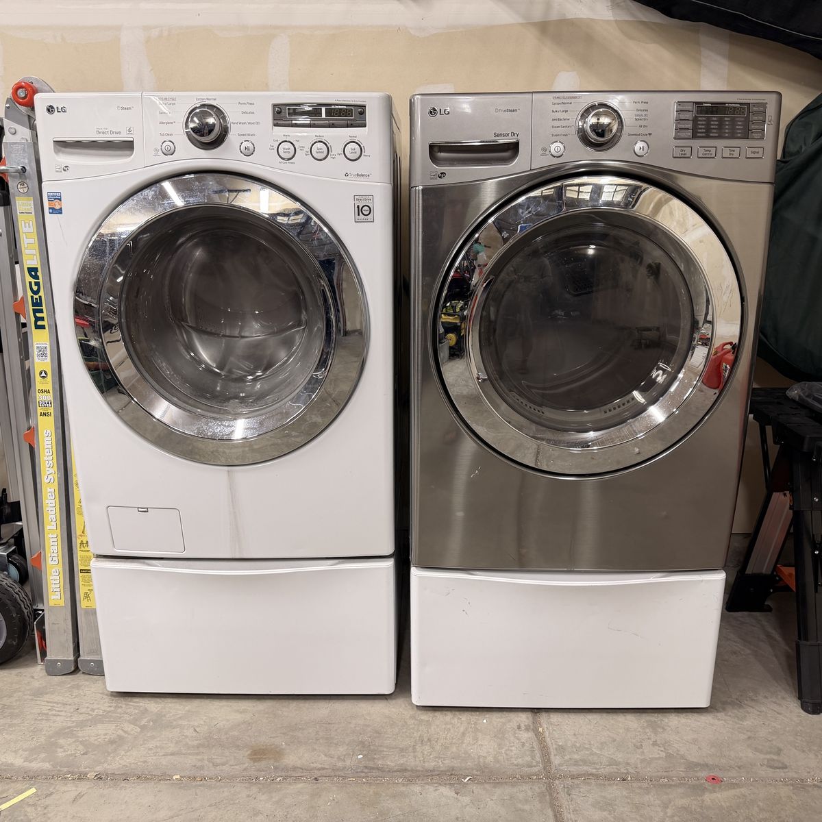 Washer and dryer with stands