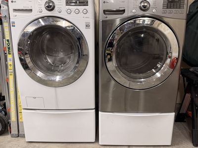 Washer and dryer with stands