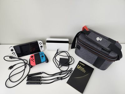 Nintendo Switch OLED + Carrying Case + Screen Protectors + 2 Extra Joy-Cons