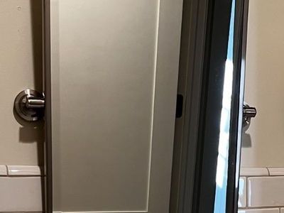 Free 18” x 24” Brushed Nickel Swivel Mirror