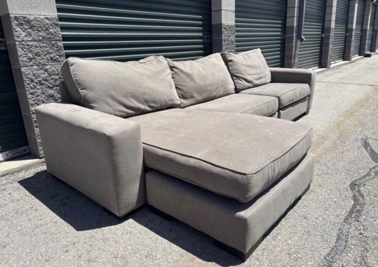 Light Beige Sectional Sofa with Reversible Chaise - Good Condition & Comfortable