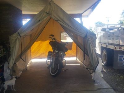 Portable Canvas Wall Tent Sheltering Motorcycle