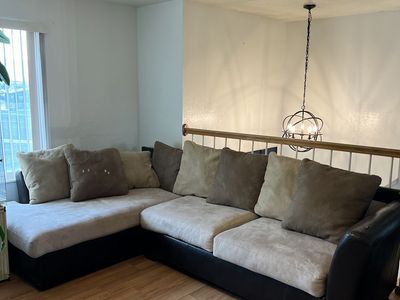 Large Sectional Couch with Soft Pillows and Faux Leather Base