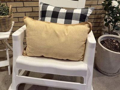 2 white plastic rocking chairs for sale!