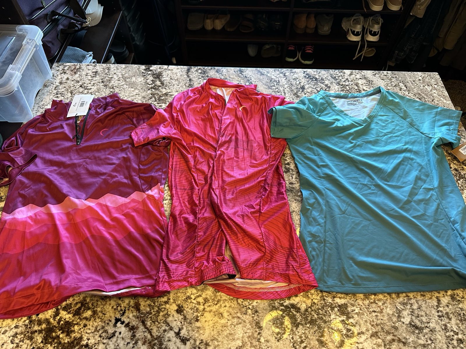 Three women’s cycling shirts, $15 for the set
