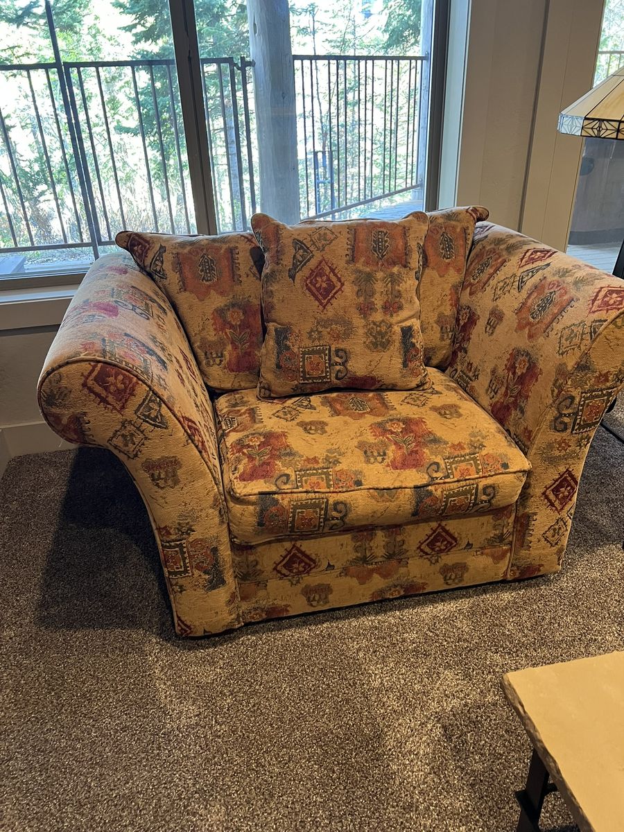 Oversized chair with pillow