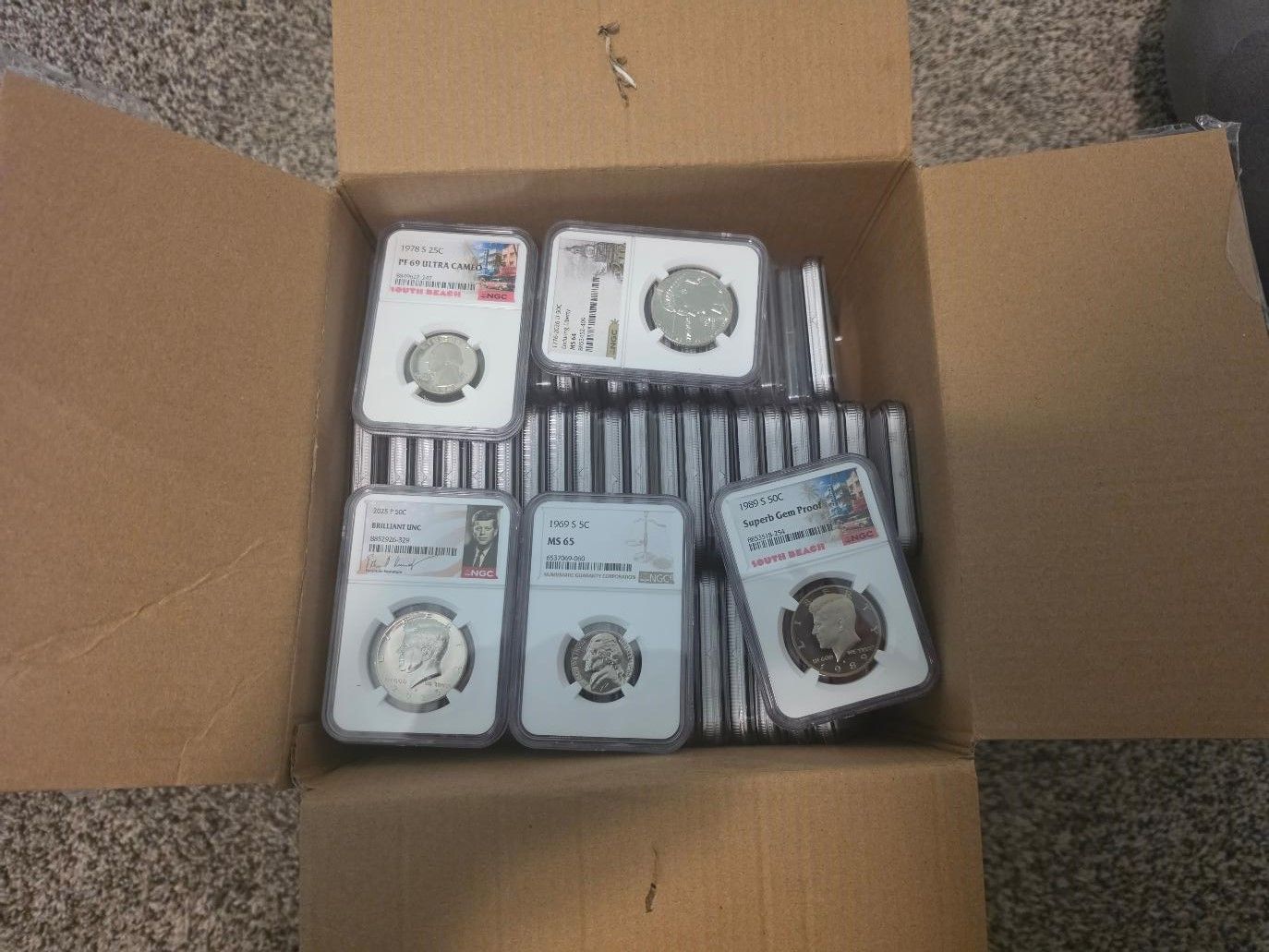 Box of 126 slabbed coins