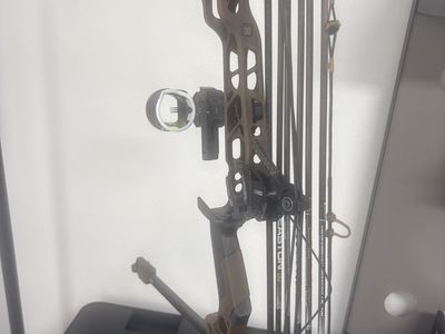 Mathews Arc 30 Compound Bow Right-Handed in Kodiak Brown with UV slider 2 three pin sight, Kodiak brown Quiver, and Qad mx 2rest