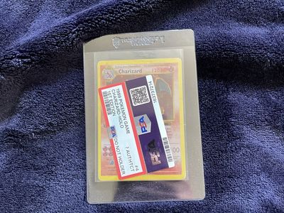 1999 Pokémon 1st Edition Charizard Holo 4/102 PSA N4 rating