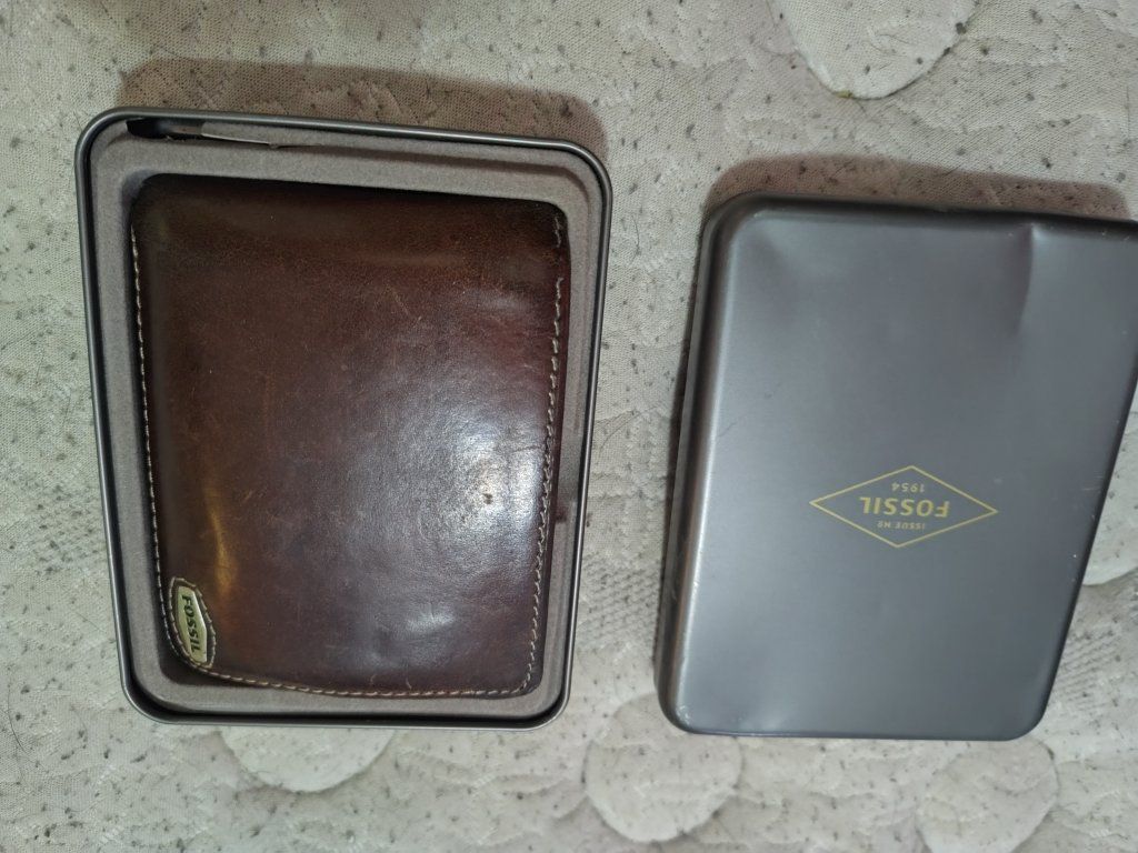brown leather Fossil wallet