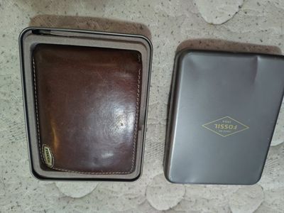 brown leather Fossil wallet