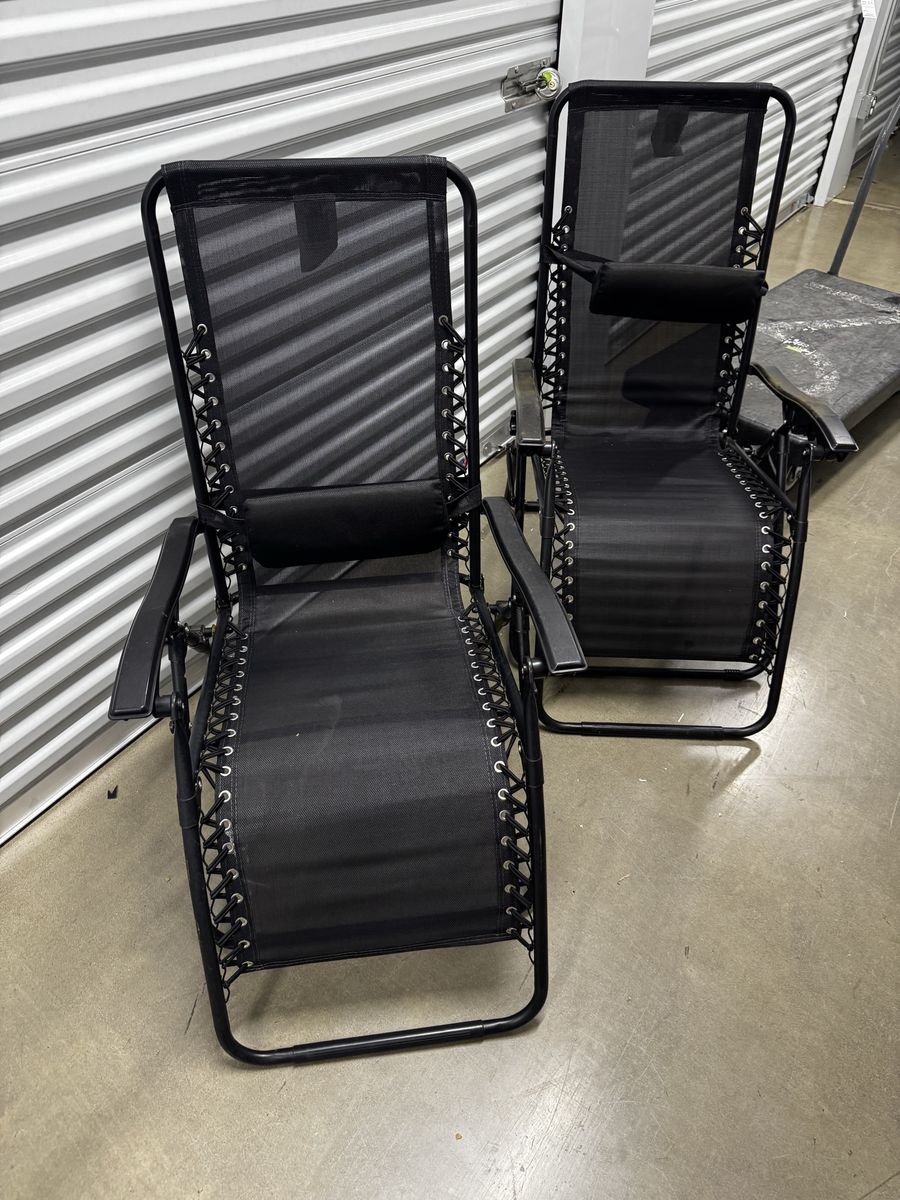 801-628-3598                                                    Set of 2 black zero gravity outdoor chairs 