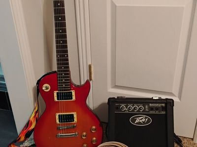 Epiphone Les Paul 100 , Peavey Backstage Amp, Strap, 15ft cable & headphones