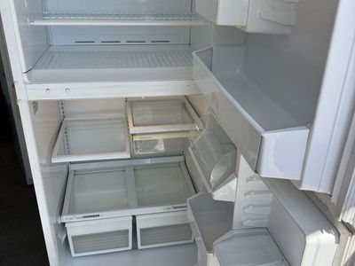 GE Profile White Top Freezer Refrigerator works great its plug in for u to see $120