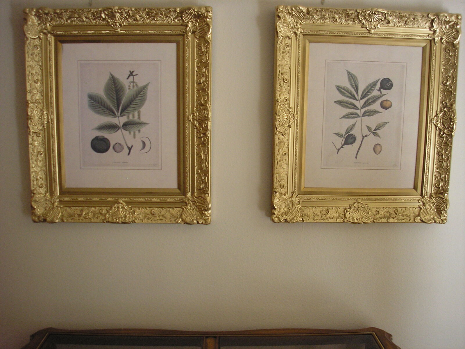 Art prints with gold frame.