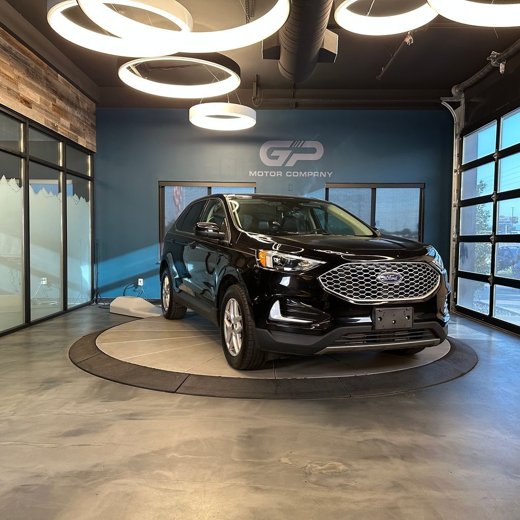 2024 Ford Edge SEL — rebuilt & branded title, 33% below market