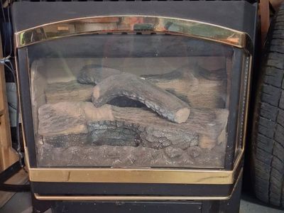 Harman Freestanding Fireplace/Wood Stove with Faux Logs, Black & Gold Trim