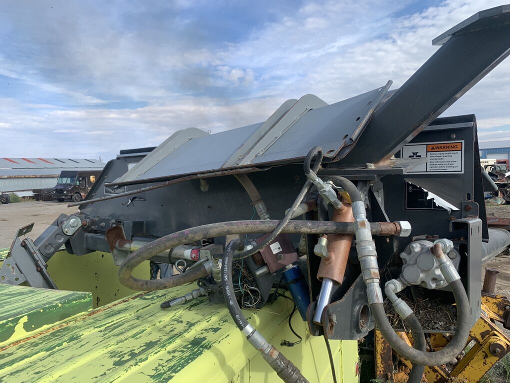 Self Propelled Windrower Merger