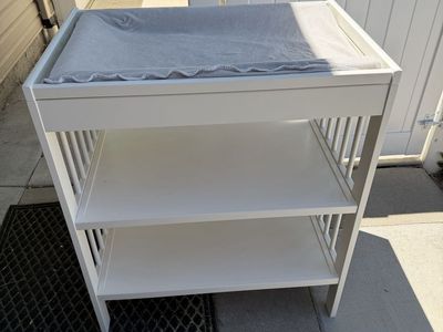 White Baby Changing Table with Storage Shelves and Changing Pad. IKEA brand