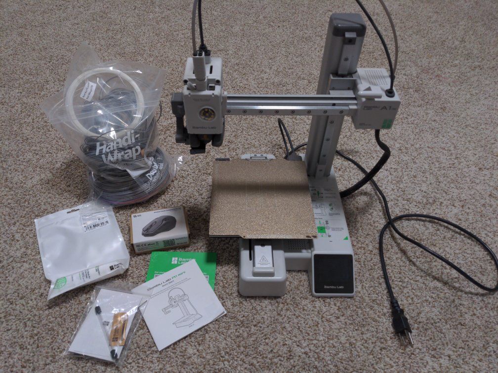 BambuLab A1 Mini 3D printer, and accessories