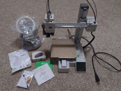 BambuLab A1 Mini 3D printer, and accessories