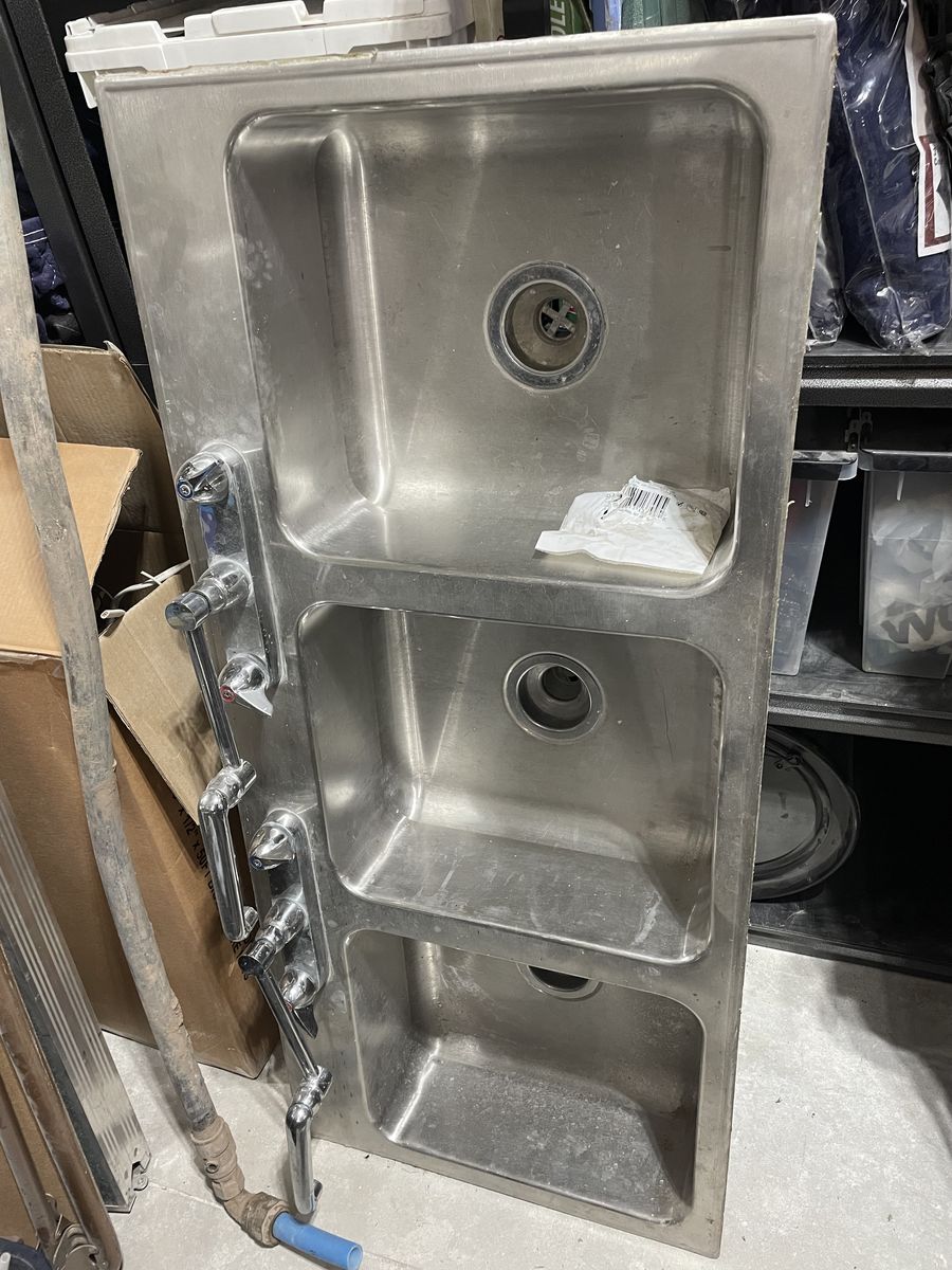 Stainless steel sink with faucet