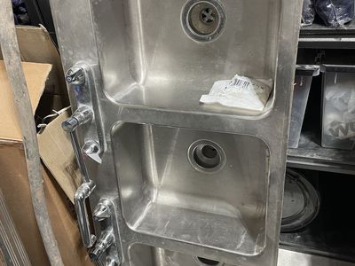 Stainless steel sink with faucet
