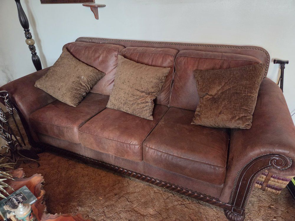 Brown Faux Leather Sofa and Matching Armchair Set with Nailhead Trim