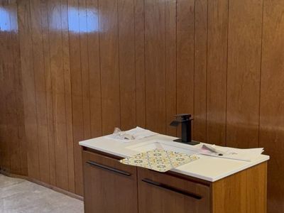 Mid-Century Modern Single Bathroom Vanity with White Top and Black Faucet